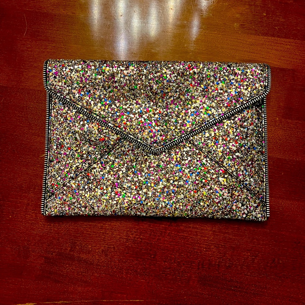 Lightly used envelope clutch. Great for a night out or a black tie event.